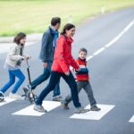 Young Family walk at the Crosswalk
